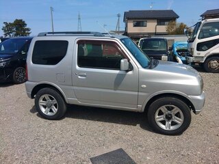 2013 Suzuki Jimny Kei car III Рестайлинг 2, серебристый, 640520 рублей, вид 4