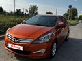 2014 Hyundai Solaris I Рестайлинг, оранжевый, 950000 рублей - вид 1