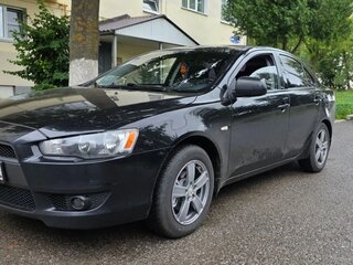 2010 Mitsubishi Lancer X, чёрный, 750000 рублей, вид 1