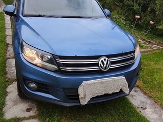 2011 Volkswagen Tiguan I Рестайлинг, серый, 899000 рублей, вид 2