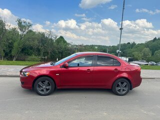 2008 Mitsubishi Lancer X, красный, 650000 рублей, вид 4