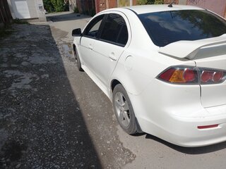 2014 Mitsubishi Lancer X Рестайлинг, белый, 619000 рублей, вид 2