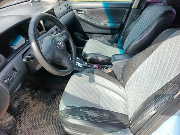 2006 Toyota Corolla IX (E120, E130) Рестайлинг, голубой - вид 4