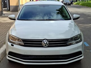 2017 Volkswagen Jetta VI Рестайлинг, белый, 900000 рублей, вид 2
