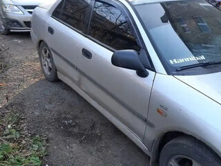 1998 Mitsubishi Carisma I, серебристый, 180000 рублей, вид 1