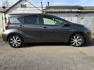 2018 Toyota Aqua I Рестайлинг 2, серый, 850000 рублей, вид 1