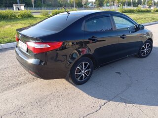 2012 Kia Rio 4-speed III, чёрный, 740000 рублей, вид 3
