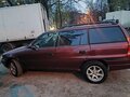 1996 Opel Astra 16LZ2 F, пурпурный, 230000 рублей - вид 6