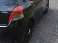 2009 Toyota Yaris II, чёрный, 600000 рублей - вид 3