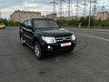 2012 Mitsubishi Pajero IV Рестайлинг 1, чёрный - вид 2