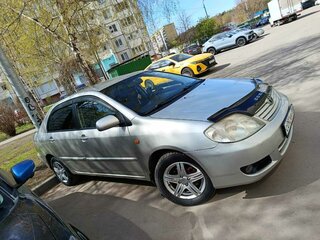 2005 Toyota Corolla IX (E120, E130) Рестайлинг, серебристый, 700000 рублей, вид 2