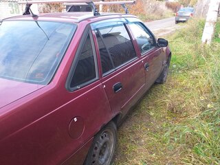 2012 Daewoo Nexia I Рестайлинг, красный, 130000 рублей, вид 4