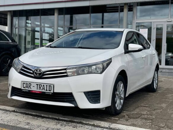 2014 Toyota Corolla XI (E160, E170, E180), белый, 1239000 рублей - вид 1