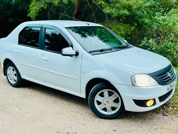 2013 Renault Logan I Рестайлинг, белый, 515000 рублей - вид 3
