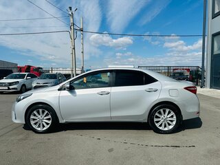 2014 Toyota Corolla XI (E160, E170, E180), серебристый, 1399000 рублей, вид 3
