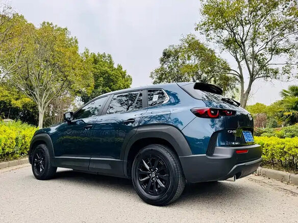 2023 Mazda CX-50, синий, 2180500 рублей - вид 3