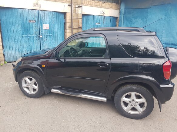 2003 Toyota RAV4 II (XA20), чёрный - вид 2