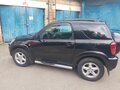 2003 Toyota RAV4 II (XA20), чёрный - вид 2