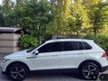 2022 Volkswagen Tiguan II Рестайлинг, белый, 2370000 рублей - вид 2