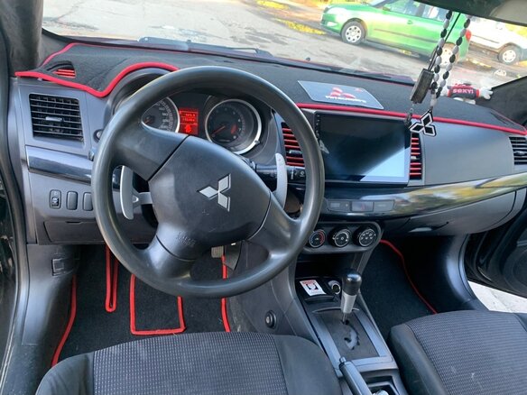 2008 Mitsubishi Lancer X, чёрный, 540000 рублей - вид 9