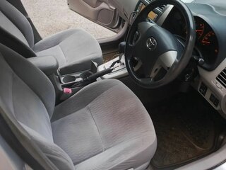 2007 Toyota Corolla Axio X (E140, E150), серый, 580000 рублей, вид 3