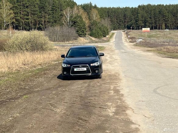2008 Mitsubishi Lancer X, чёрный, 650000 рублей - вид 33