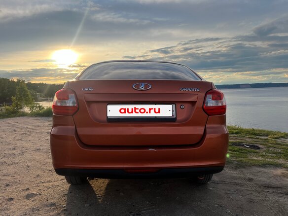 2014 Lada (ВАЗ) Granta I, оранжевый, 280000 рублей - вид 5