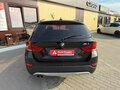 2014 BMW X1 20i I (E84) Рестайлинг, коричневый, 1480000 рублей - вид 4
