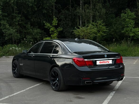 2011 BMW 7 серии 750i xDrive V (F01/F02/F04), чёрный - вид 4