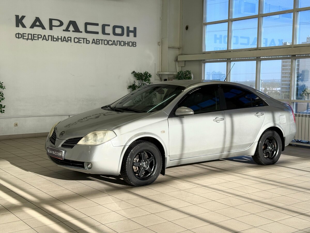 Открыть фотографии: Nissan Primera III (P12)