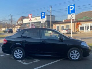 2012 Nissan Tiida I Рестайлинг, чёрный, 900000 рублей, вид 3