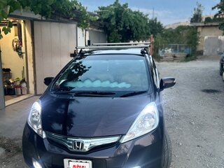 2012 Honda Fit Hybrid II, коричневый, 900000 рублей, вид 5