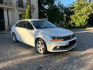 2016 Volkswagen Jetta VI Рестайлинг, белый, 1200000 рублей, вид 1