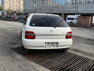 1998 Toyota Corolla II V (L50), белый, 313000 рублей, вид 4