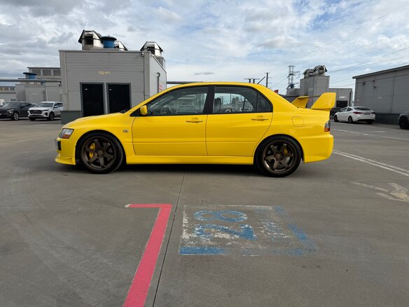 2006 Mitsubishi Lancer Evolution IX, жёлтый - вид 7