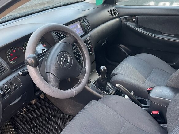 2004 Toyota Corolla IX (E120, E130), серый, 370000 рублей - вид 7