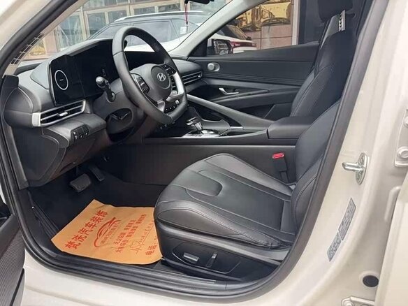 2023 Hyundai Elantra N Line VII (CN7) Рестайлинг, белый - вид 3