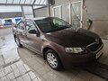 2015 Skoda Octavia III (A7), коричневый, 600000 рублей