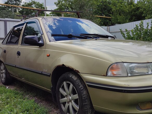 2007 Daewoo Nexia I, золотистый, 160000 рублей - вид 1