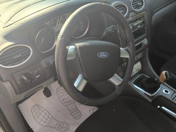 2009 Ford Focus II Рестайлинг, серый, 440000 рублей - вид 1