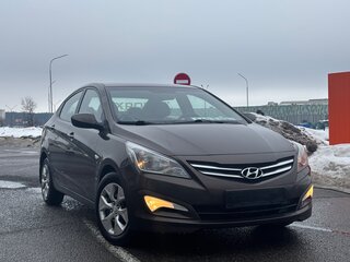 2014 Hyundai Solaris I Рестайлинг, коричневый, 950000 рублей, вид 3