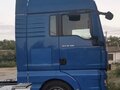 2009 MAN TGX, синий, 2600000 рублей - вид 1