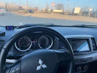 2011 Mitsubishi Lancer X Рестайлинг, серебристый, 600000 рублей, вид 4