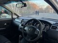 2010 Nissan Tiida I Рестайлинг, белый, 570000 рублей - вид 4