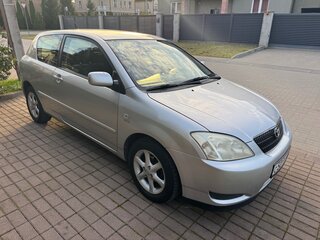 2003 Toyota Corolla IX (E120, E130), серебристый, 700000 рублей, вид 2