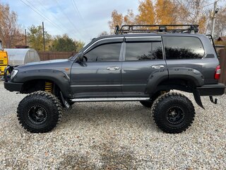 2004 Toyota Land Cruiser 105 100 Series Рестайлинг 1, серый, 5015000 рублей, вид 2