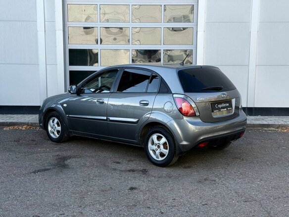 2010 Kia Rio II Рестайлинг, серебристый - вид 2