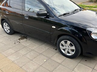 2011 Kia Rio II Рестайлинг, чёрный, 720000 рублей, вид 1