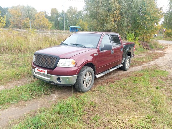 2004 Ford F-150 XI, пурпурный - вид 1