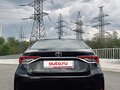 2019 Toyota Corolla XII (E210), коричневый, 1900000 рублей - вид 4